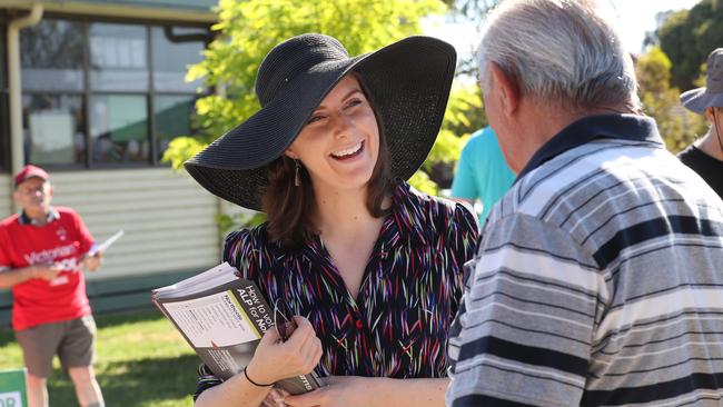 Labor candidate Clare Burns talks to a resident ahead of the Northcote by-election. Picture: David Crosling