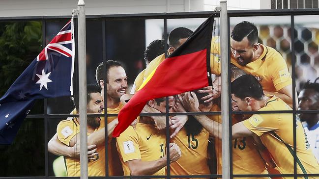 The Socceroos train at Stadium Trudovye Rezervy on Wednesday 13th June ahead of their opening World Cup match against France at Kazan Arena on Saturday. Large photos are displayed around the facility to make it feel more like home with the Australian and Aboriginal flags flown. Picture: Toby Zerna