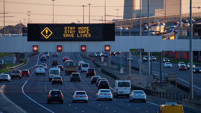 A virus warning sign on the West Gate Freeway. Picture: Mark Stewart