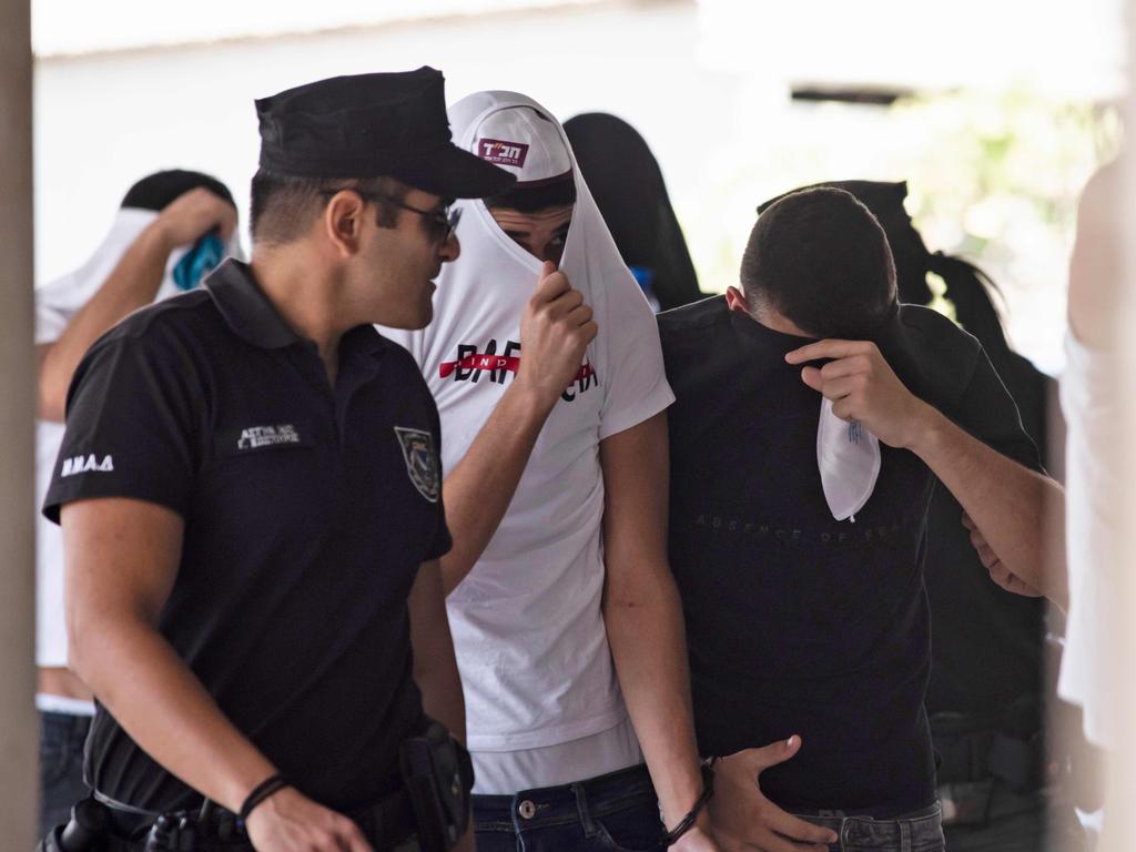 The Israeli tourists arriving at court back in 2019 after they were arrested. Picture: Iakovos Hatzistavrou/AFP