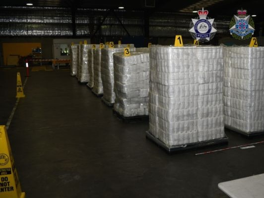 Four men charged after 600kg of methamphetamine hidden in toilet rolls seized in Melbourne.