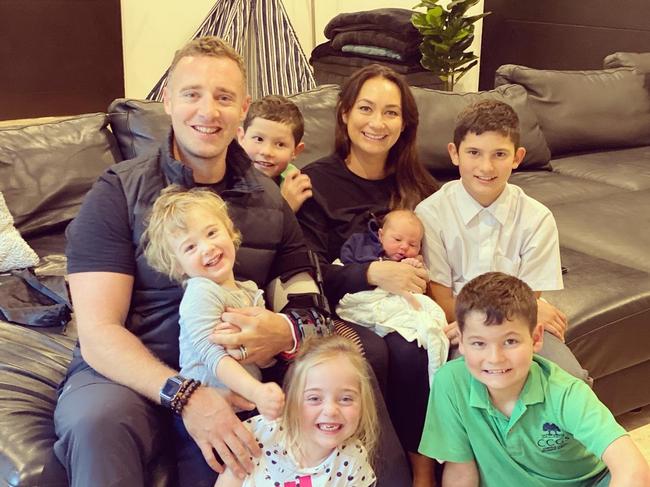 Daine McDonald and wife Lauren, pictured with their six children, purchased a house in Wamberal this year and are currently selling their previous home in the region - a stunning mansion in Matcham. NSW real estate.