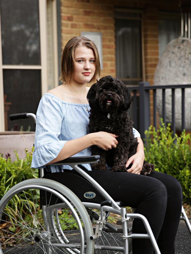 Danica McDougall 17 with her dog. Picture: Adam Yip. News Corp copyright.