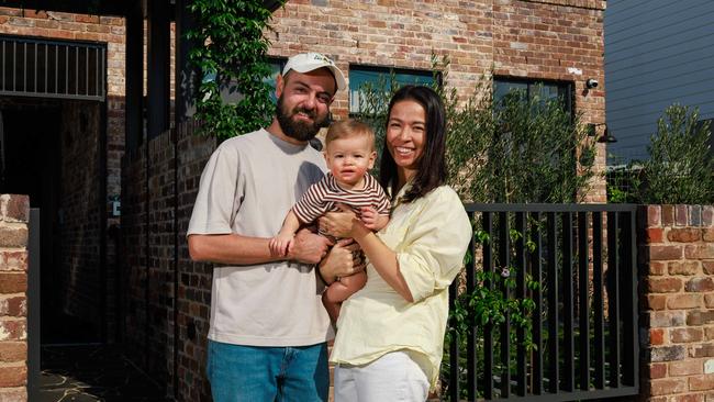 Home seekers Peter and Nadia Yannopoulos, with son Louka, said they were unsure of what to make of the tax relief. Picture: Justin Lloyd.