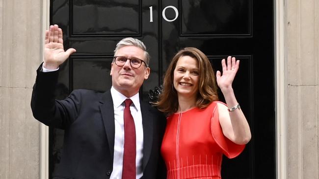 Labour leader and incoming Prime Minister Sir Keir Starmer and wife Victoria greet supporters as they enter 10 Downing Street following Labour's landslide election victory. Picture: Leon Neal/Getty Images