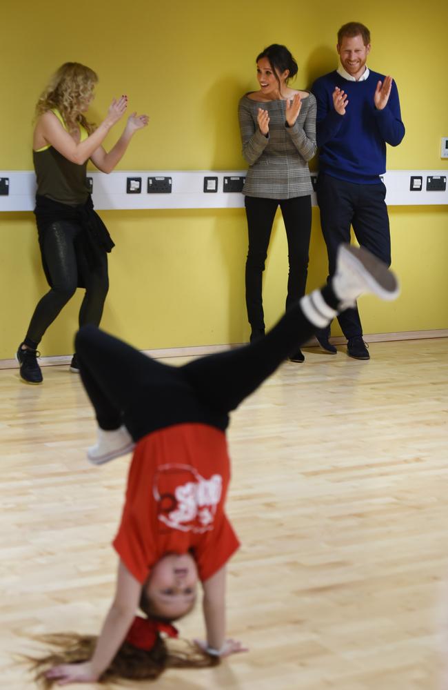 Britain’s Prince Harry and his fiancée Meghan Markle attend a street dance class during their visit to Star Hub community and leisure centre in the Tremorfa area of Cardiff, south Wales on January 18, 2018. Picture: Getty