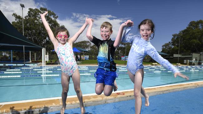 Annabel, Sebastien and Amelia Birbeck at Gawler's Aquatic Centre at Essex Park, which will soon begin a $155 million overhaul. Picture: Naomi Jellicoe