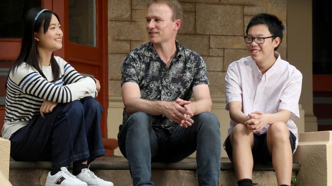 Glenunga IB leader Corin Bone with two of his school’s highest achievers, Cynthia Zhao and Sam Feng, who both scored 44 of a possible 45. Picture: Dean Martin