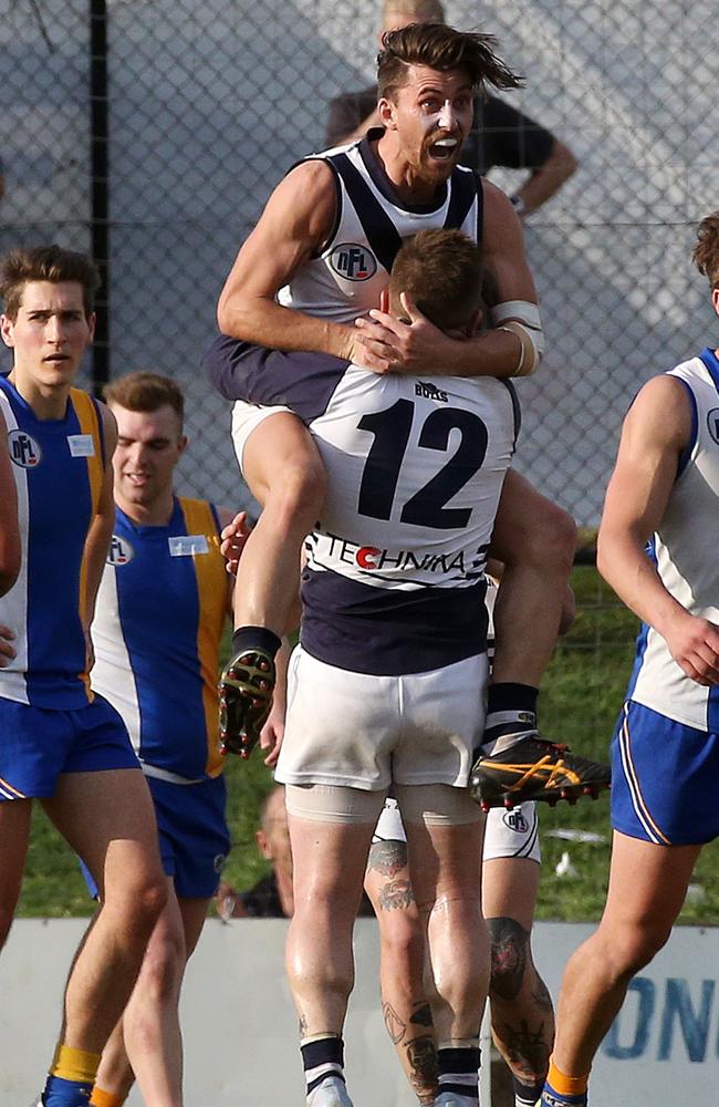 Bundoora celebrates a valuable goal against the wind during last year’s Division 1 grand final. Picture: George Salpigtidis.