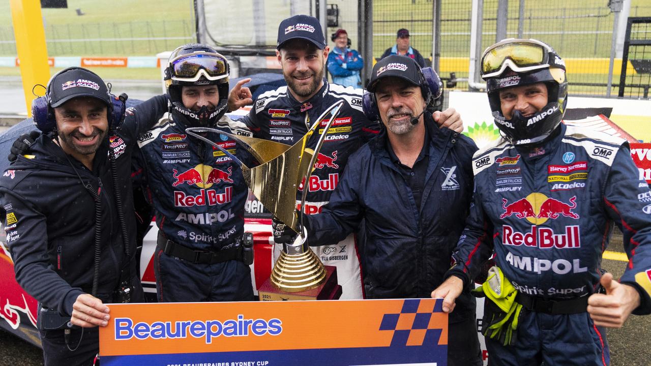 Van Gisbergen and his team celebrate their big win with the Sydney Cup and cheque.