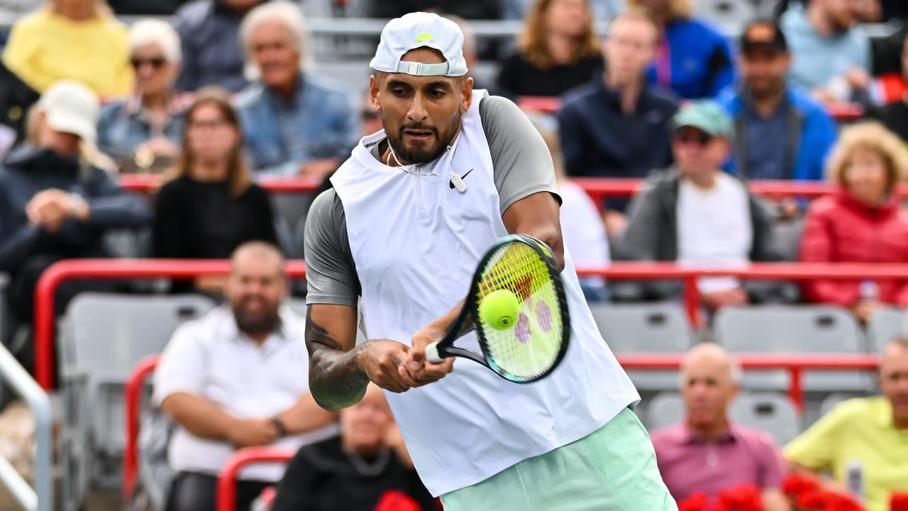 MONTREAL, QUEBEC - AUGUST 09: Nick Kyrgios of Australia hits a return against Sebastian Baez of Argentina during Day 4 of the National Bank Open at Stade IGA on August 9, 2022 in Montreal, Canada. (Photo by Minas Panagiotakis/Getty Images)