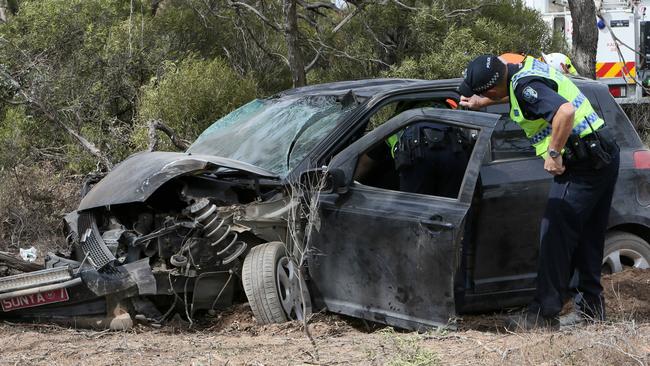 Investigators, Police, SES and Tow truck workers at the crash scene of motor vehicle accident on the Yorke Peninsula. Picture: Emma Brasier