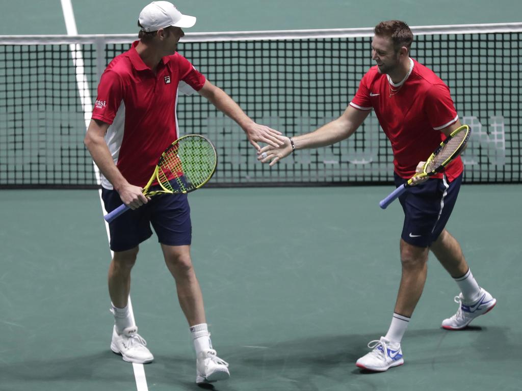 US Sam Querrey, right, and Jack Sock celebrate a point around 2am.