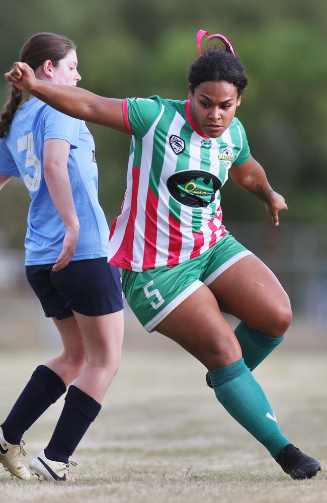 Townsville Warriors FC beat Estates FC 6-0 in round 3 of the Queensland Kappa Cup. Warriors player Shaynodah Smit and Estates Lara Goodwin. Picture: Sharon Woodward.