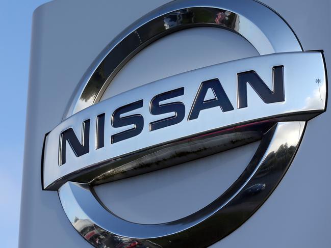 (FILES) In this file photo taken on October 25, 2016 The logo of Japanese car giant Nissan stands in the forecourt of a Nissan car dealership in Sunderland, north east England on October 25, 2016. - Japanese car manufacturer Nissan announced on February 3, 2019 it was cancelling plans to build its X-Trail SUV at its plant in northeast England despite Brexit assurances from the government. (Photo by SCOTT HEPPELL / AFP)