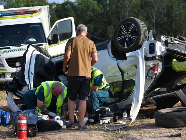 Emergency services respond to a single-vehicle accident on the Bruce Highway between Ingham and Townsville. Picture: Cameron Bates