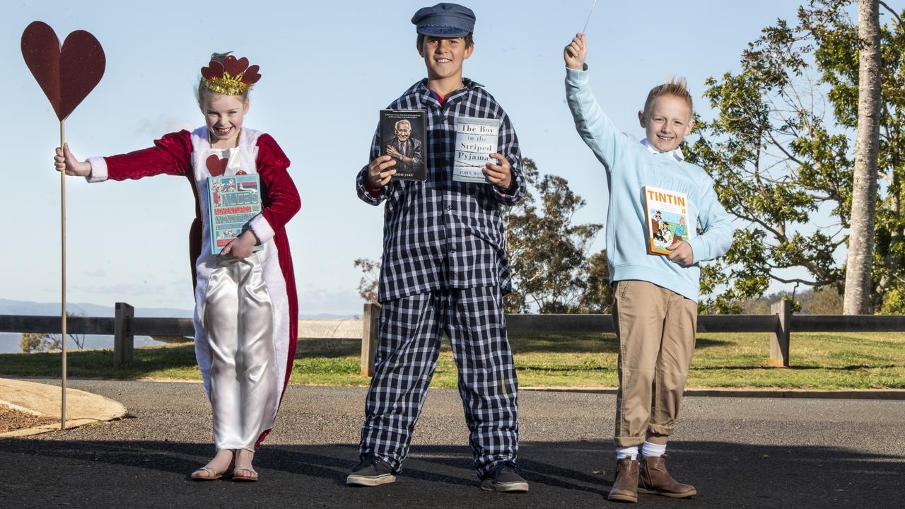 Celebrating Book Week are Toowoomba Anglican School students (from left) Rose Oldham, Toby Goldthorpe and Charlie Elliott. Picture: Nev Madsen.