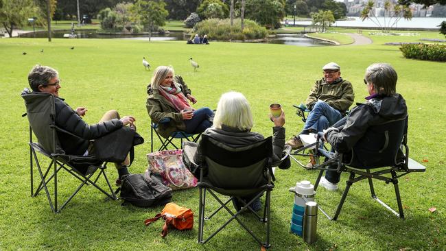 This group of friends wasted no time in getting the picnic gear out on September 13 (Photo by Brendon Thorne/Getty Images)