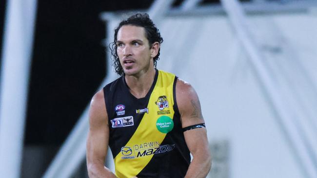 Cam Ilett with ball in hand for Nightcliff Tigers in the 2022-23 NTFL season. Picture: Celina Whan / AFLNT Media