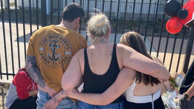 Yarrabilba State Secondary College student Lochlen Cocoran was riding his e-scooter to school on Tuesday morning, July 12, when he lost control in a tragic accident, now a memorial has been set up at the site of the crash.