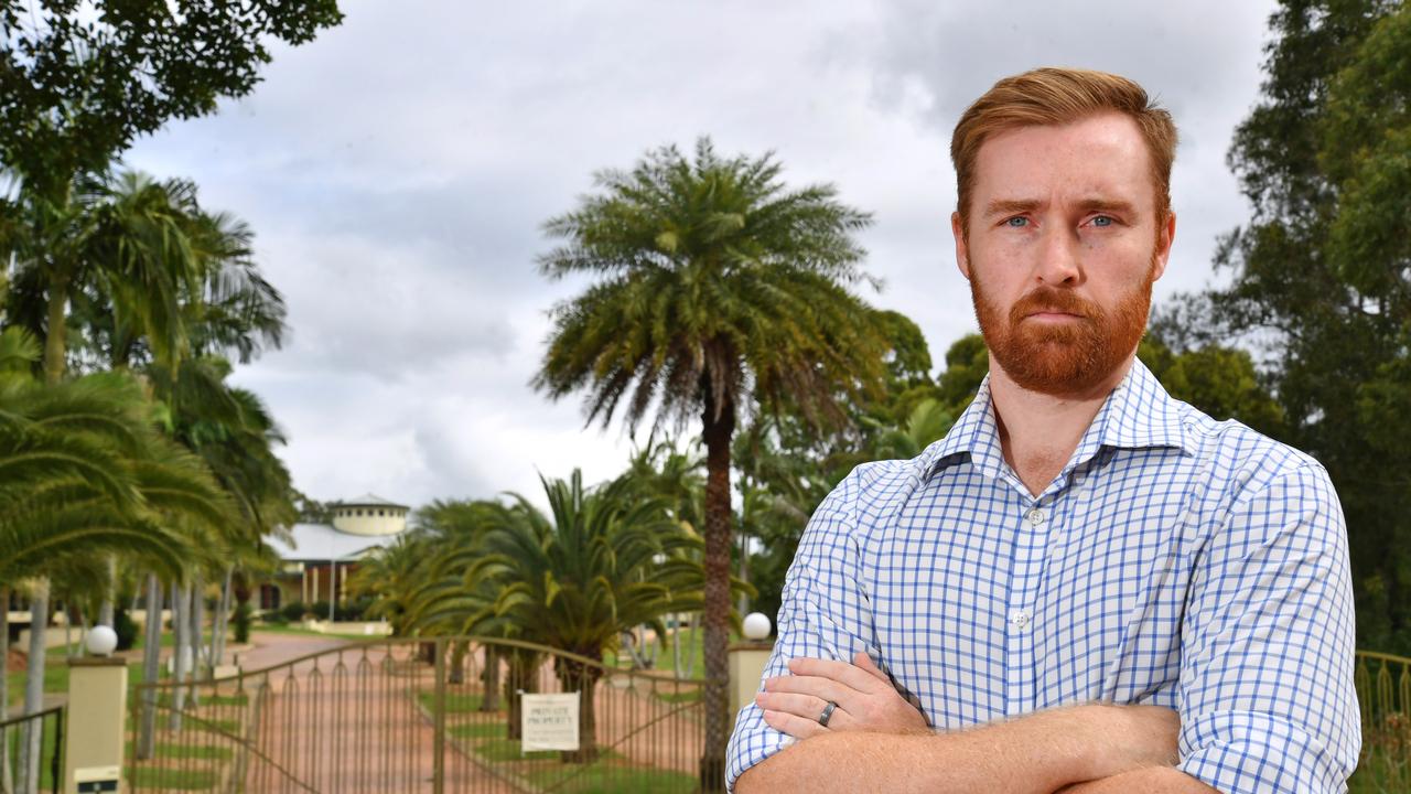 Councillor Joe Wilkinson outside the gates to the Arundel Hills Country Club. Picture: John Gass