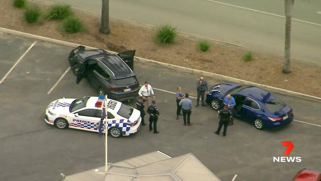 Queensland Ambulance paramedics have taken a Gold Coast police officer to hospital after he was hit by a stolen car at the Gem Hotel in Alberton. Picture: 7 News