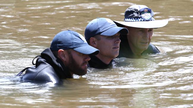 Police divers during the search for the body of Tiahleigh Palmer in the Pimpama River. Picture: Regi Varghese