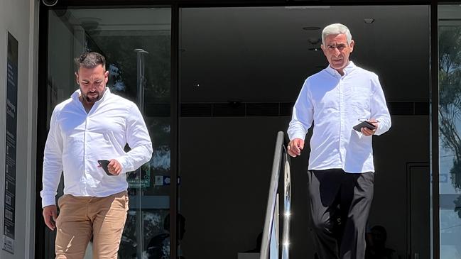 Ljube Velevski (right) leaving Wollongong Local Court with his nephew on Monday. Picture: Dylan Arvela