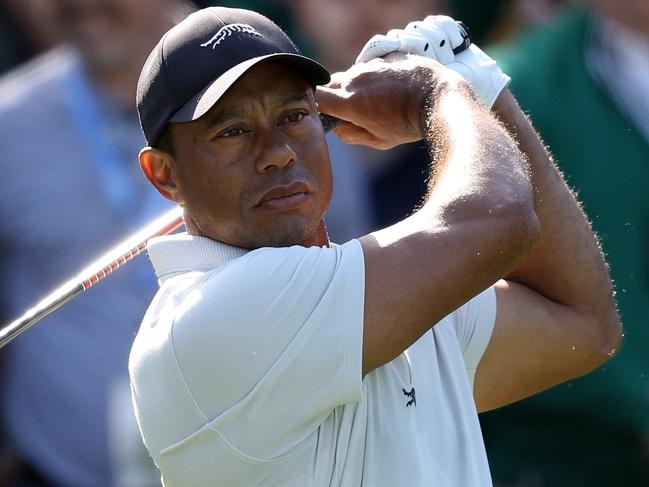 AUGUSTA, GEORGIA - APRIL 08: Tiger Woods of the United States plays a shot during a practice round prior to the 2024 Masters Tournament at Augusta National Golf Club on April 08, 2024 in Augusta, Georgia. (Photo by Warren Little/Getty Images)