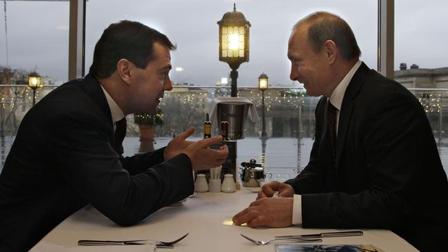 Dmitry Medvedev and Vladimir Putin dine in Saint Petersburg.