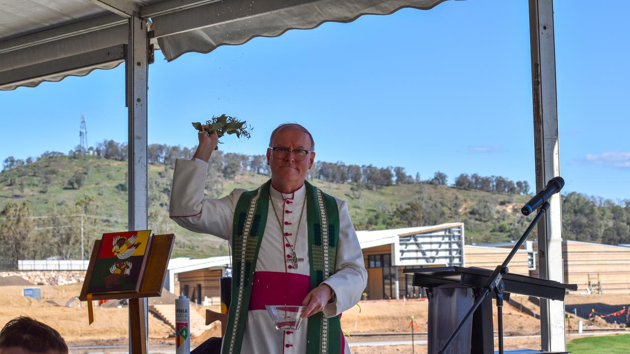 Reverend Ken Howell, Auxiliary Bishop of Brisbane blesses the soil of Sophia College