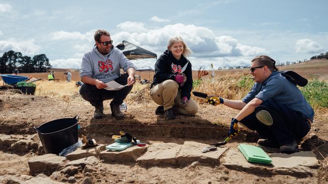 Brad Williams (left) Southern Midlands Council Manager Heritage Projects, with students Lucy Council and Declan Pape at the site of the former Picton convict probation station, an 1830s Tasmanian penal quadrangle. Picture: OSBORNE IMAGES