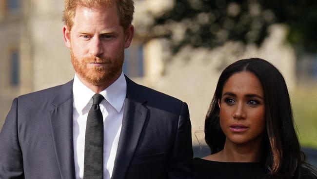 Prince Harry and Meghan, Duchess of Sussex on the long Walk at Windsor Castle on September 10, 2022, before meeting well-wishers. (Photo by Kirsty O'Connor / POOL / AFP)