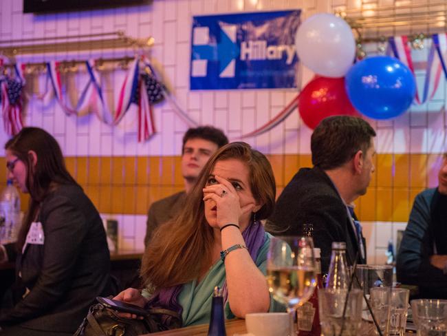 Can’t look. Polls too shocking for Clinton supporters at Marylebone Sports Bar and Grill in London, England. Picture: Chris J Ratcliffe/Getty Images