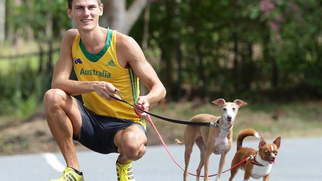 Dane Bird-Smith walking with his dogs Pina and Rocky.  Pic Peter Wallis