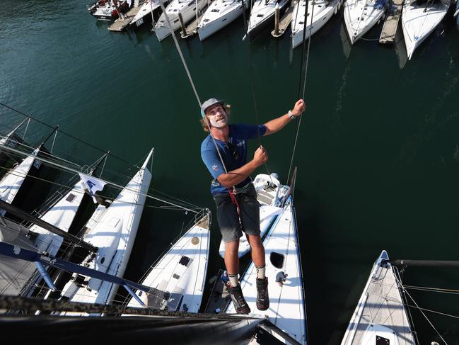 23/12/22: Warrior Won bowman, Dylan Vogel, 30  from Rhode Island up the mast at the CYCA. John Feder/The Australian.