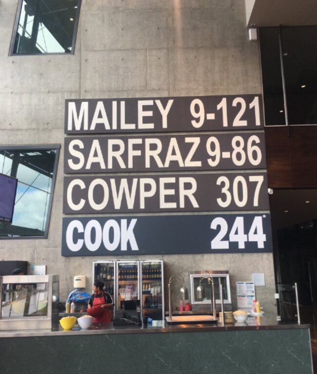 Cook’s name was added to a sign in the member’s bar.