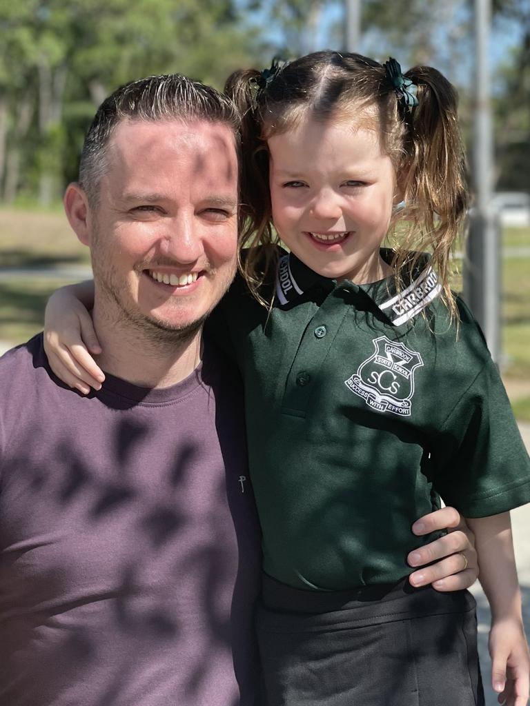 Aurora Carolyn and dad Steven Carolyn on the first day of school in 2024 at Carbrook State School. Pictures: Elliott Turner