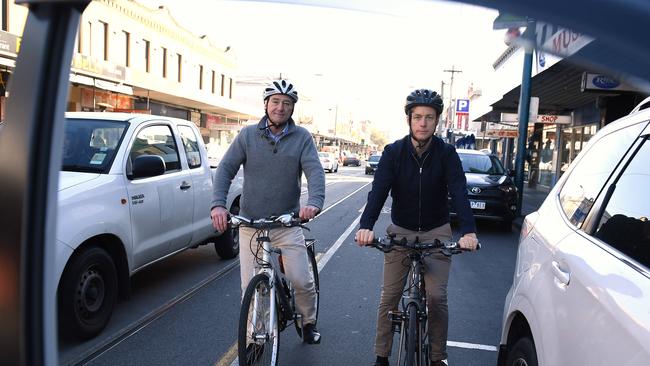 Boyd Fraser and Greens MP Sam Hibbins with their bikes on Chapel Street. Picture: Andy Brownbill