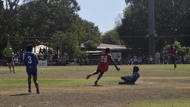 Players in action during the Tiwi Island Football League grand final between Tuyu Buffaloes and Pumarali Thunder. Picture: Max Hatzoglou