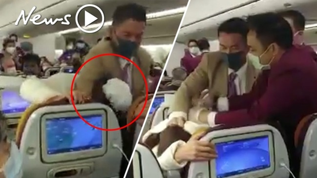 WATCH: Chinese passenger tackled on flight after sparking coronavirus panic