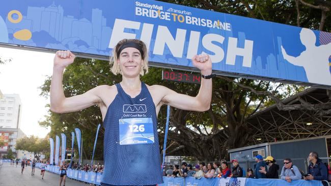 The Sunday Mail Transurban Bridge to Brisbane finish line on Sunday 28 August 2022. 10km Elite men's winner Liam Boudin. Picture: Jerad Williams