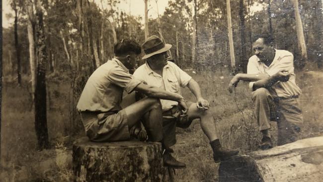 From left, Frank Straker, Eric Crooke, Alan Trist sitting on spotted gum at Allies Creek 1947. Picture: John Crooke