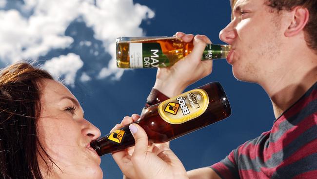 Hannah Rockliffe, 20, and David Swan, 22, enjoy a beer.