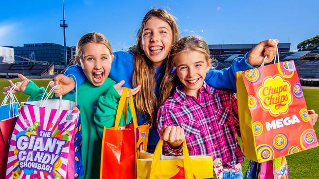 Peggy Mackenzie, 10, Charlotte Pentland, 11 and Esther McKeering, 11, excited about this year’s showbag offering. Picture: Nigel Hallett