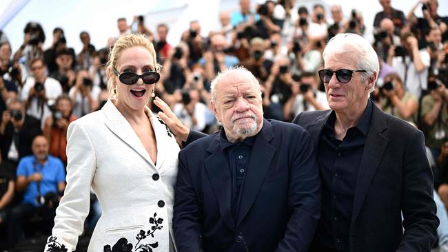 Oh Canada star Uma Thurman with US director Paul Schrader and co-star Richard Gere on the red carpet. Picture: Loic Venance / AFP