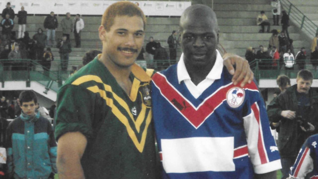 Australian Schoolboys Team of the Century centre Justin Hodges with an opponent after the opening Test of the epic 1999 tour of France, Ireland and England.