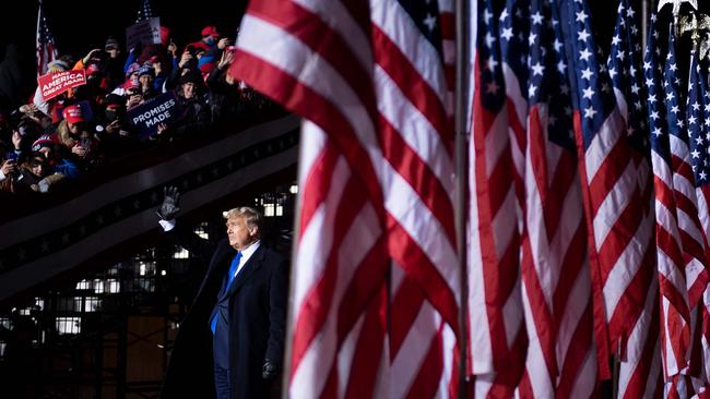 US President Donald Trump waves as he leaves after speaking during a Make America Great Again rally at Eppley Airfield in Omaha, Nebraska on October 27. Picture: AFP