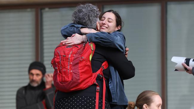 Blockade Australia protesters are released on bail from Surry Hills Police Station on June 28. Pictured is Isabel Sleiman (right). Picture: David Swift