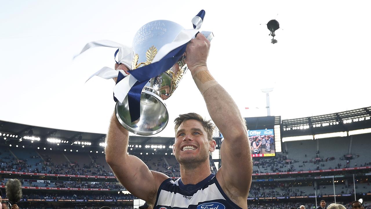 MELBOURNE, AUSTRALIA - SEPTEMBER 24: Tom Hawkins of the Cats holds aloft the premiership cup after winning the 2022 AFL Grand Final match between the Geelong Cats and the Sydney Swans at the Melbourne Cricket Ground on September 24, 2022 in Melbourne, Australia. (Photo by Daniel Pockett/AFL Photos/via Getty Images)